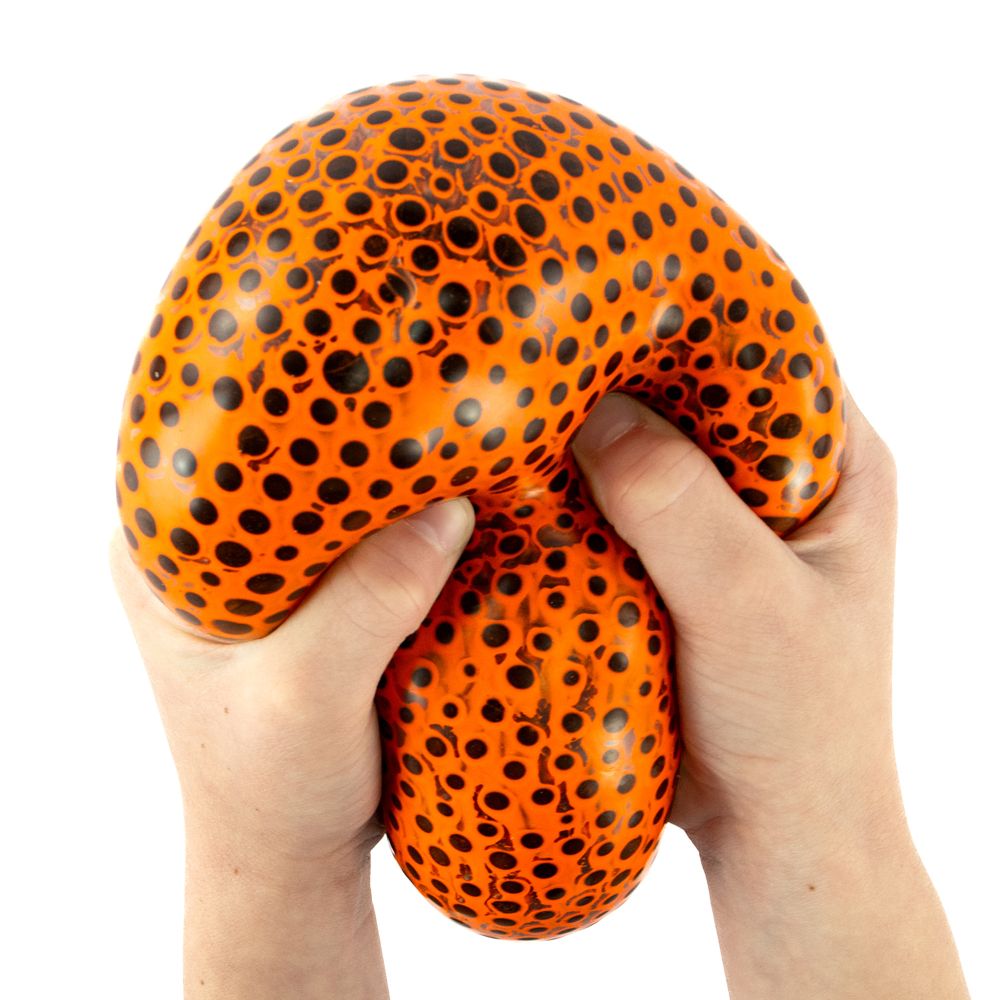 Two hands squeezing and stretching an orange Beadz Alive giant ball
