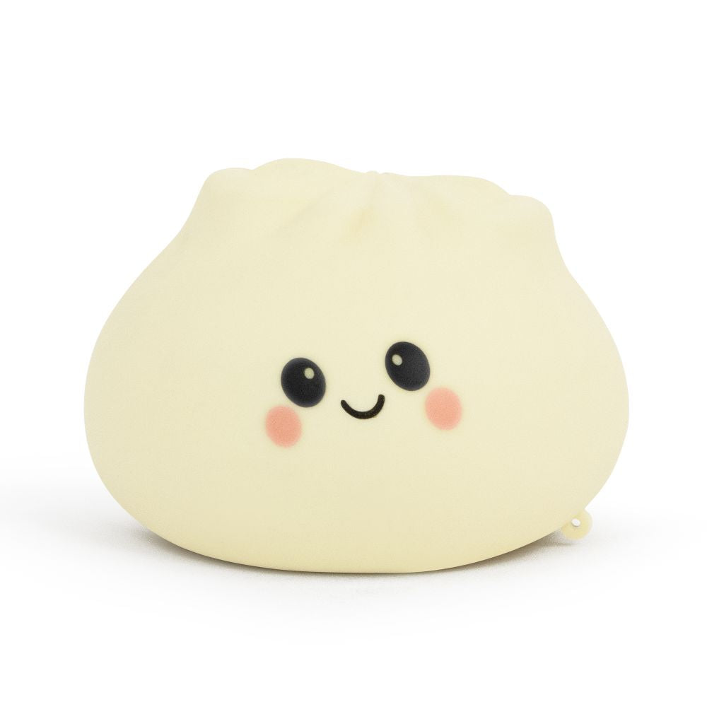 Cream Big Squij Dumpling squishy toy with a smiling face, standing alone