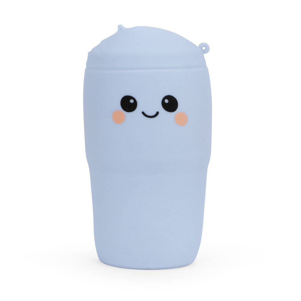 Pastel blue Big Squij Tumbler squishy toy with a smiling face, standing alone