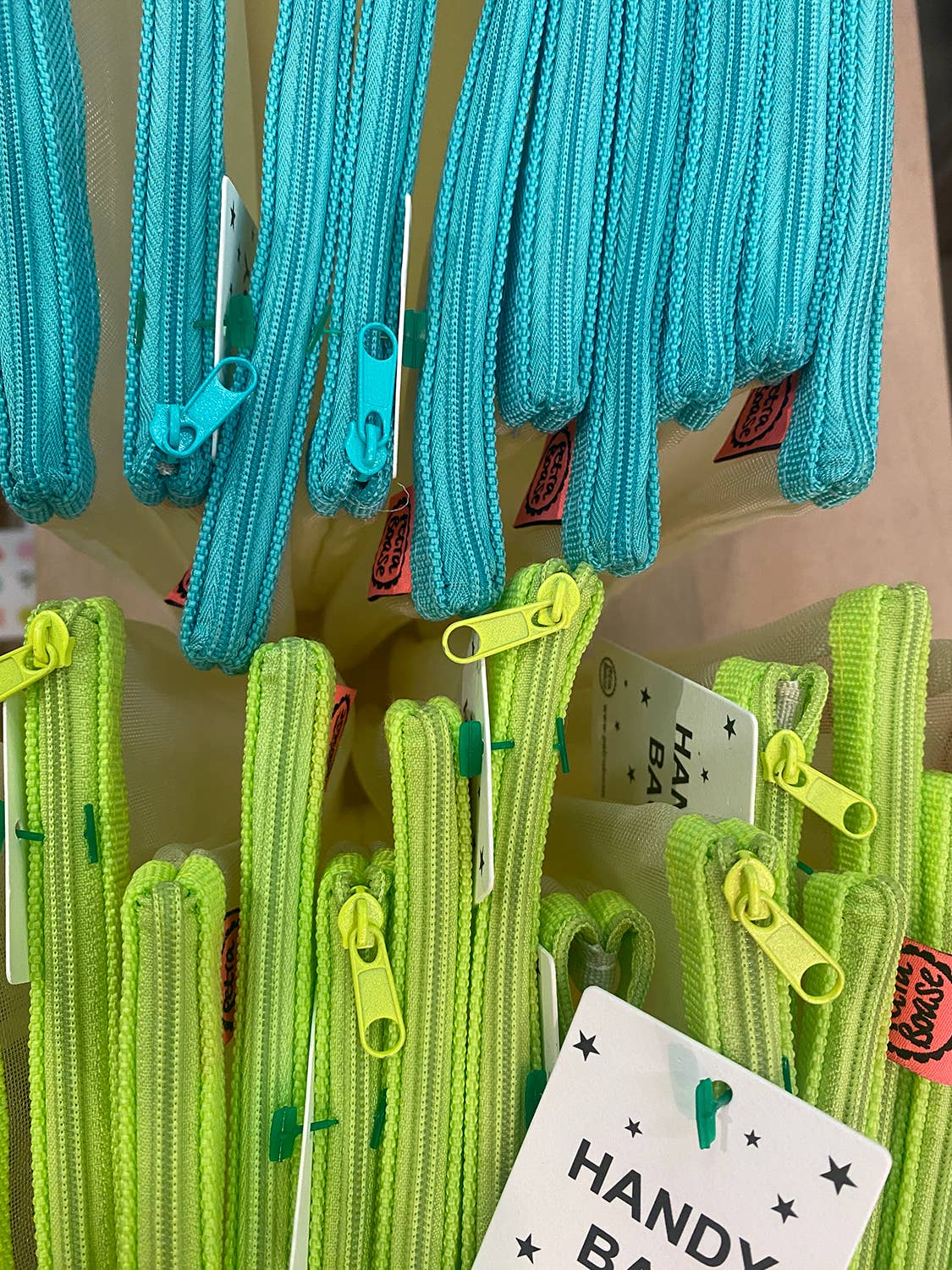 blue and acid yellow zipper pouches