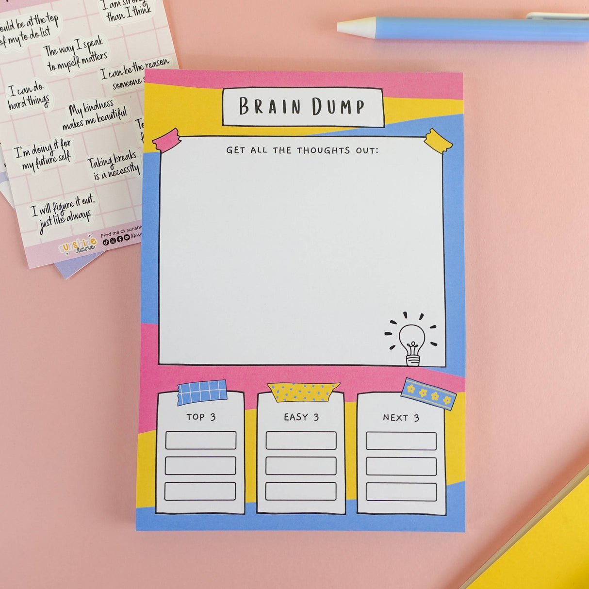 Brain dump notepad with top 3, easy 3 and next 3 task sections, pink blue yellow