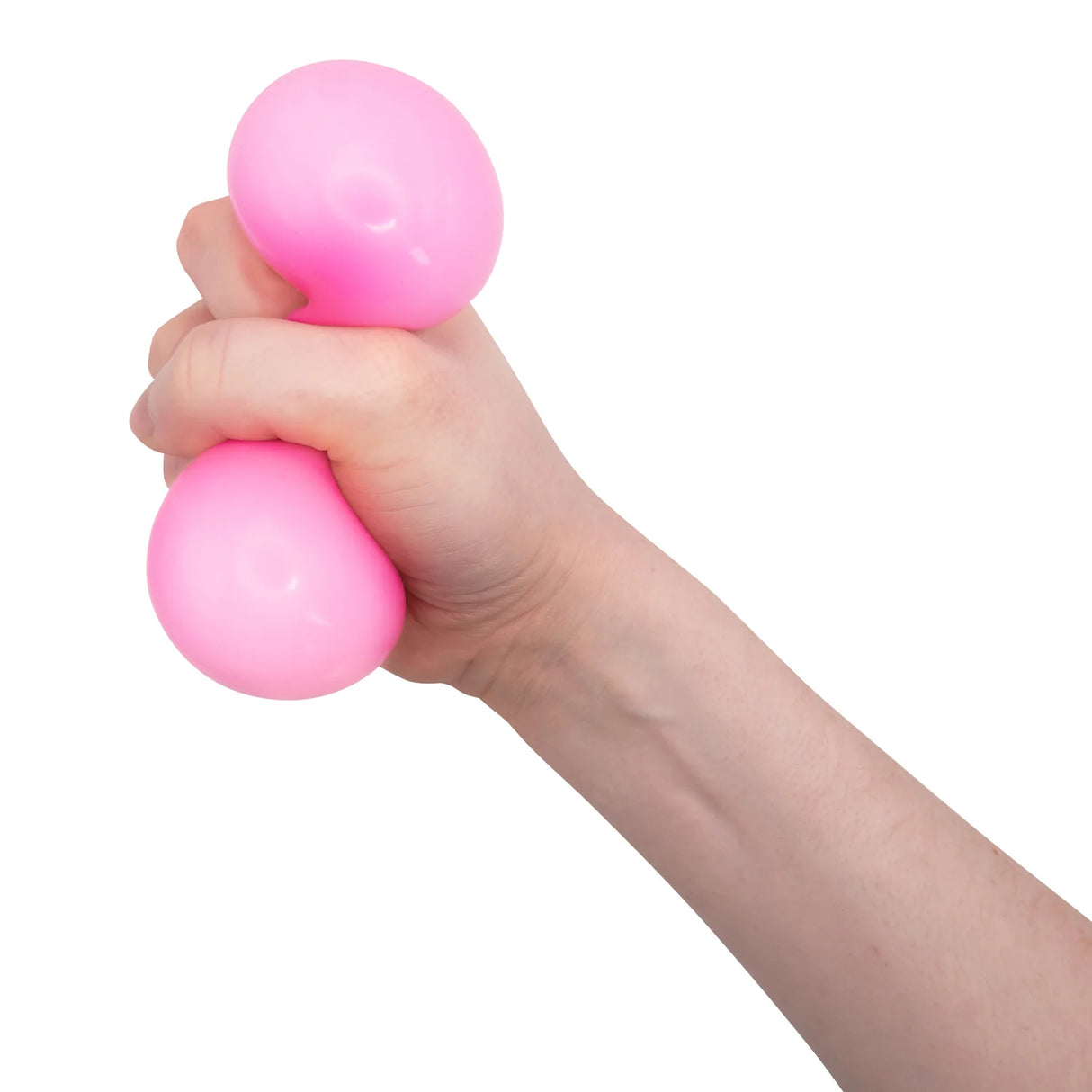 Hand squeezing a bright pink bubblegum scented squish ball showing the material deforming