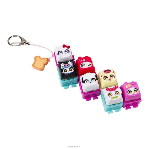 Six connected Clickeez Hello Kitty and Friends character charms on a keyring clip