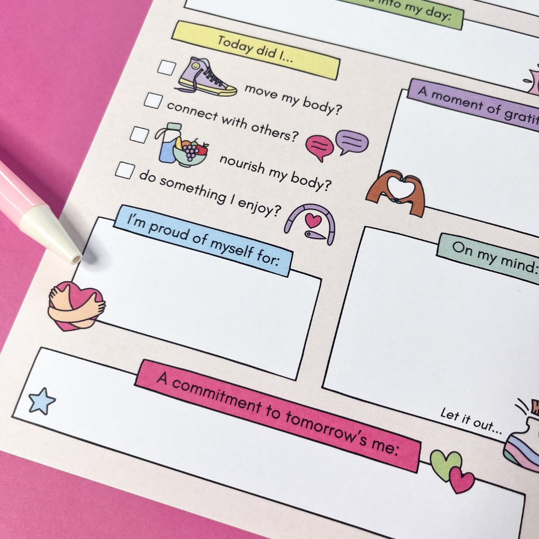 Daily Focus notepad self-care checklist and commitment section close-up