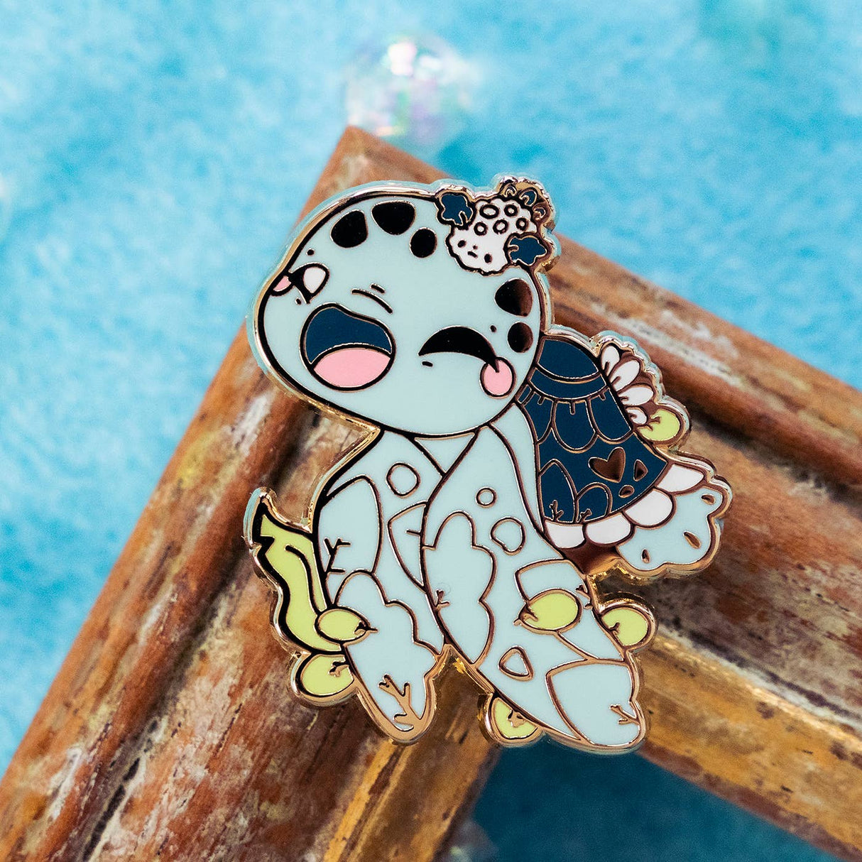 Evy Benita Leatherback Sea Turtle enamel pin with white flowers, gold plating