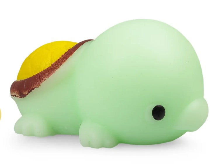 Green kawaii turtle giant mochi squishy fidget toy close-up showing shell detail