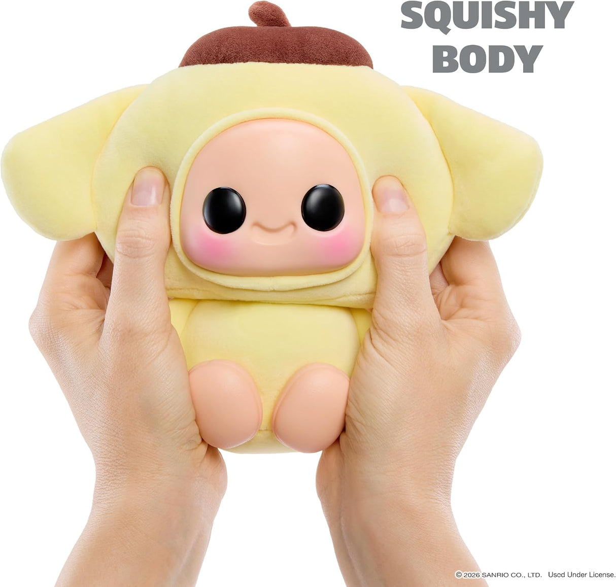 Hands squeezing Hyojo Pompompurin squishy plush toy, soft sensory keychain collectible