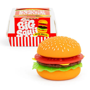 Assembled Keycraft Big Squij Peel 'N Stack Burger squishy toy shown in front of its red and white packaging box