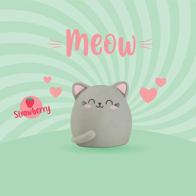 Grey cat shaped Legami eraser with pink ears on a green background with Meow text and strawberry scent icon