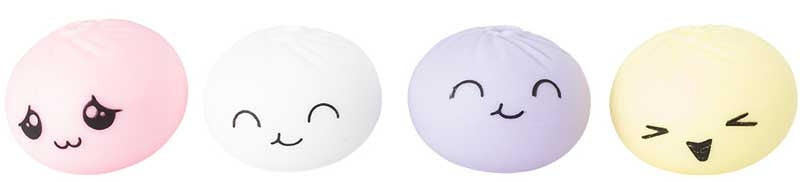 Four mini bao buddies squish toys out of box showing different facial expressions