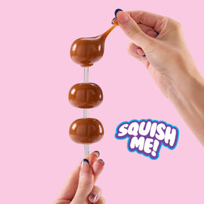 Mush Meez Sweet Friends chocolate Taba Squishie squishy fidget toy being stretched