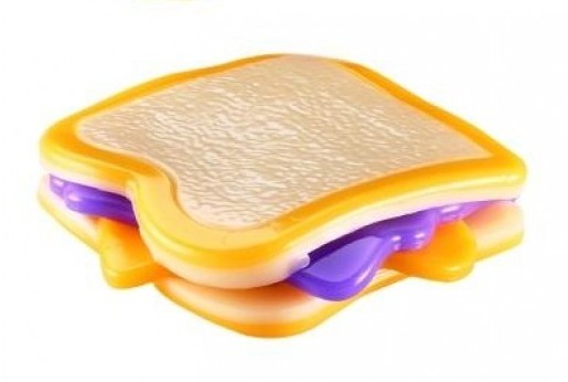 Mushmeez peanut butter and jelly sandwich taba squishy showing layered yellow, white and purple compound