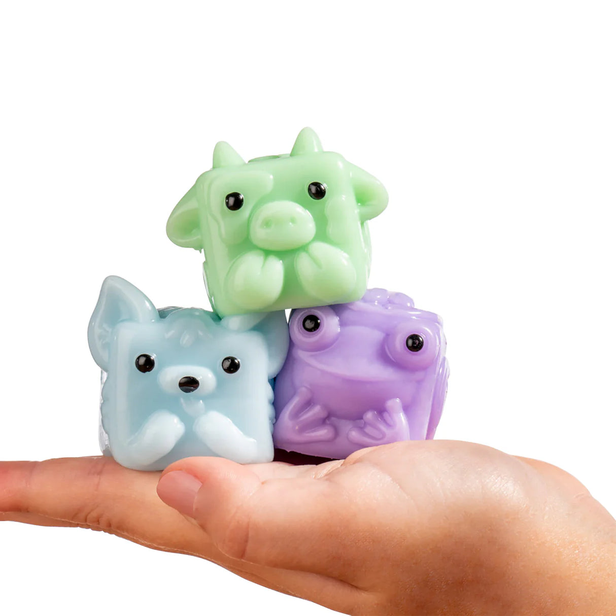 MushyKinz Mini Mystery Mushy pastel squishy figures stacked in hand