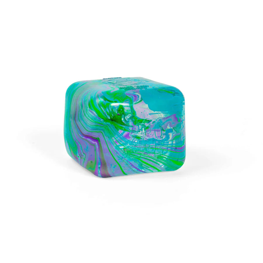 Teal and green marbled Nee Doh Nice Cube Swirl on a white background