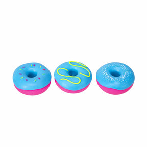 Three blue NeeDoh Dohnuts showing sprinkle, drizzle and pearl frosting designs