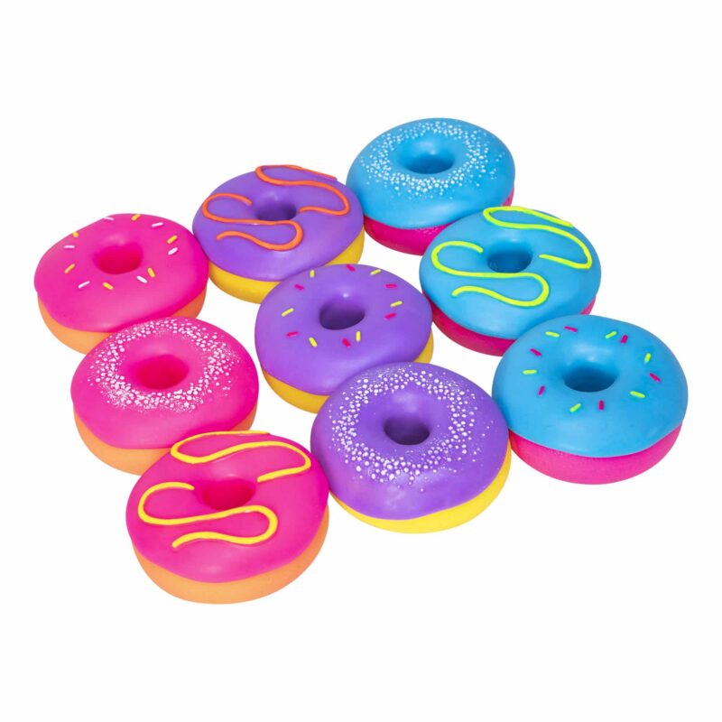 Nine NeeDoh Dohnut squishy toys scattered in assorted pink, purple and blue colours and frosting designs