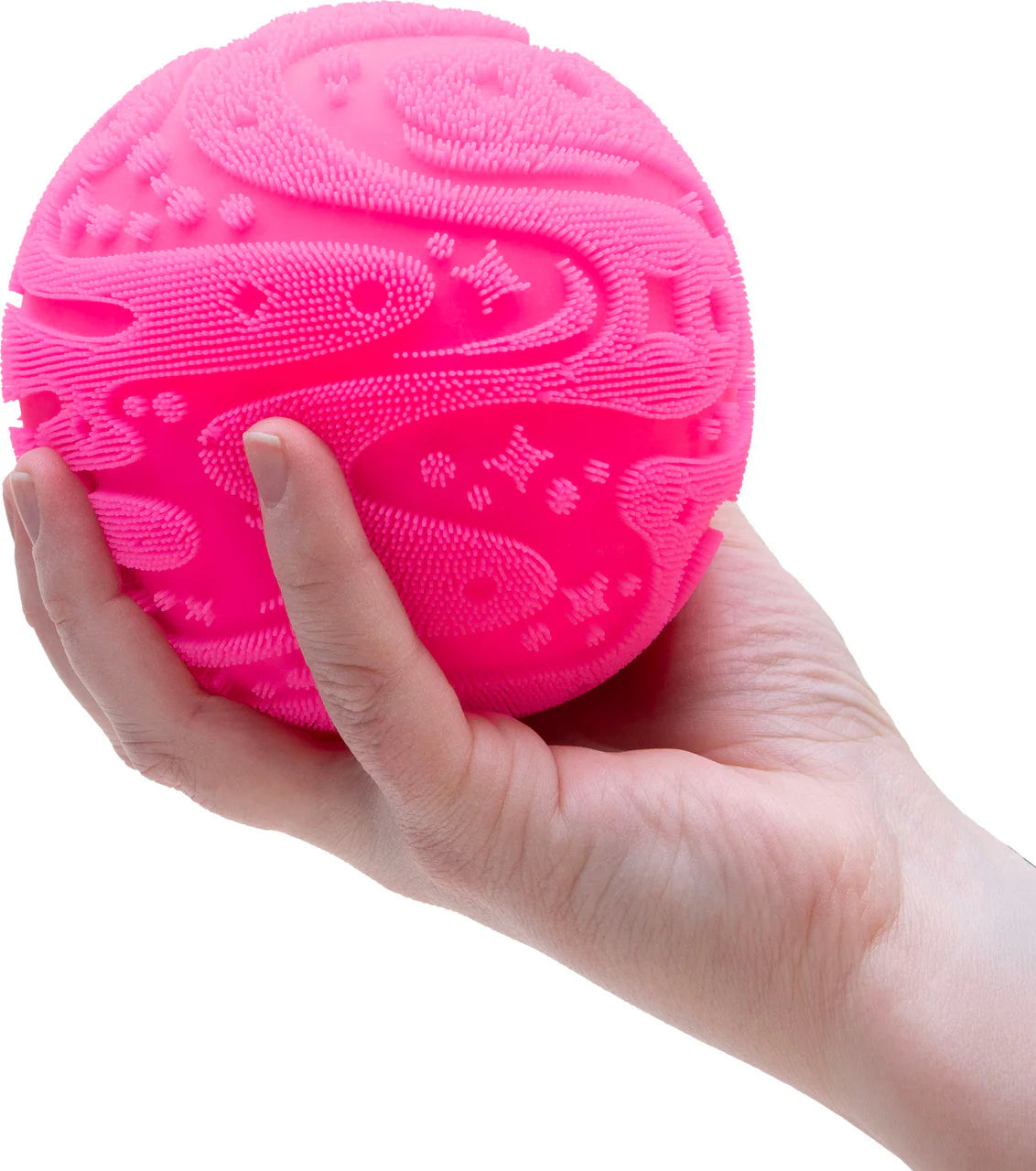 Pink NeeDoh Super Fuzz Ball held in hand, fidget sensory toy
