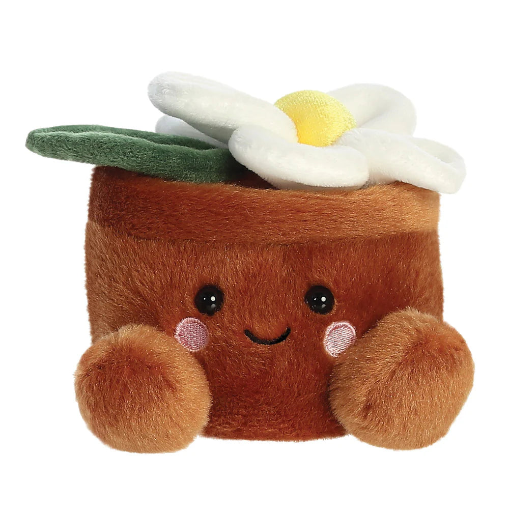 Aurora Palm Pals Junie Daisy plush β a brown square plant pot soft toy topped with a white daisy flower and a green leaf, with pink blushed cheeks and a smiling face