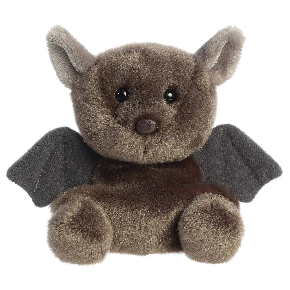 Aurora Palm Pals Luna Bat plush — a dark brown bat soft toy with dark grey fabric wings, rounded ears, a small brown nose, and a compact seated pose against a white background