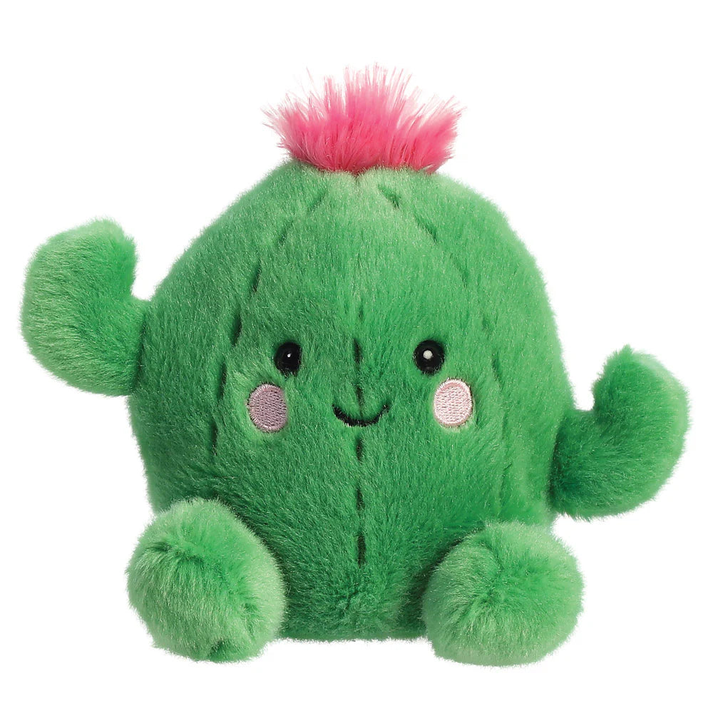 Aurora Palm Pals cactus plush β a round green cactus soft toy with embroidered ridges, small side arms, a bright pink fluffy tuft on top, and a cheerful smiling face