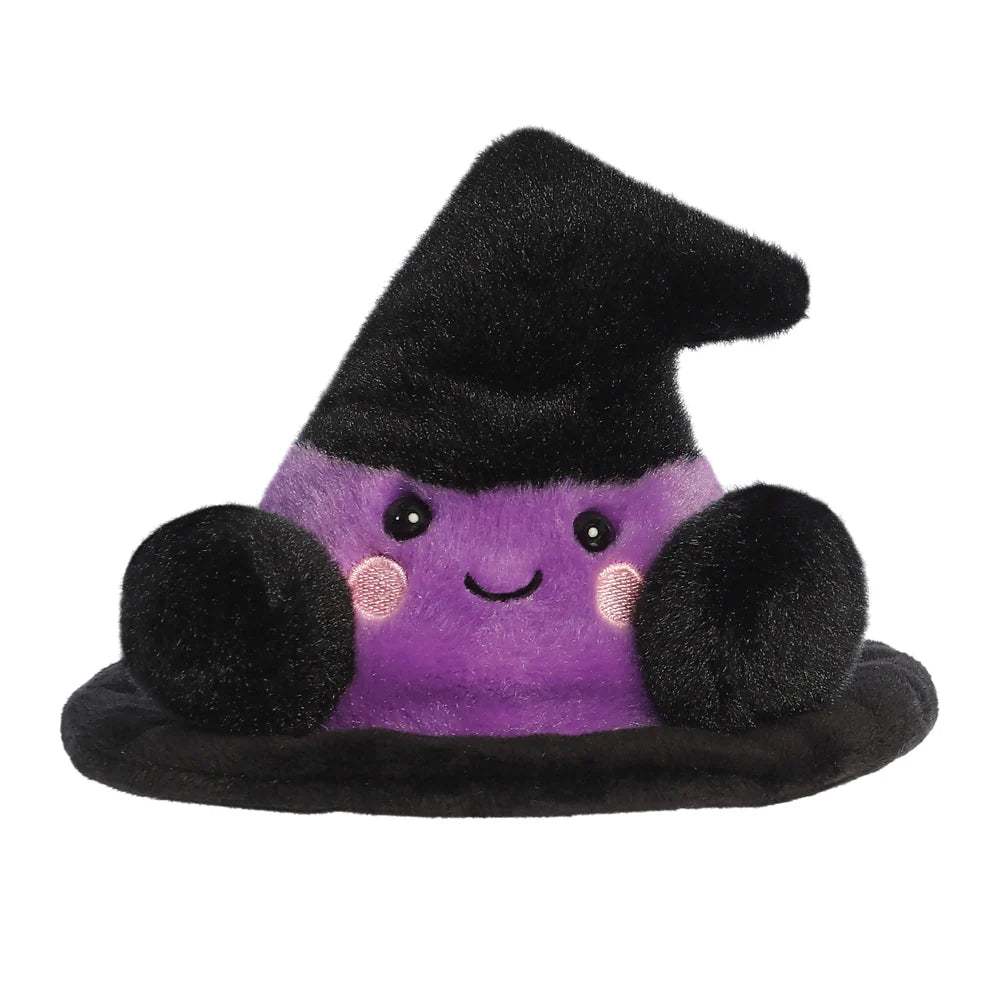 Purple plush toy with a black witch hat on a white background