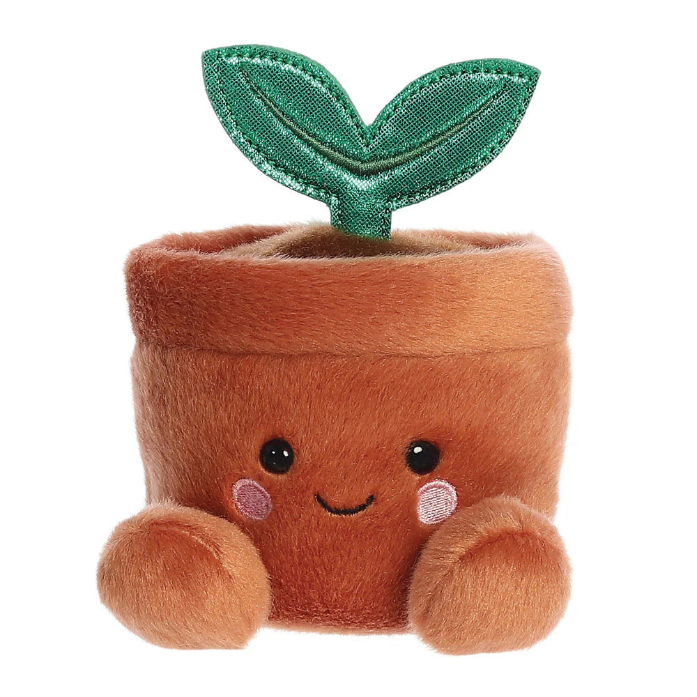 Aurora Palm Pals Terra Potted Plant plush β a terracotta-coloured round plant pot soft toy with two shiny green leaves sprouting from the top, pink cheeks, and a smiling face