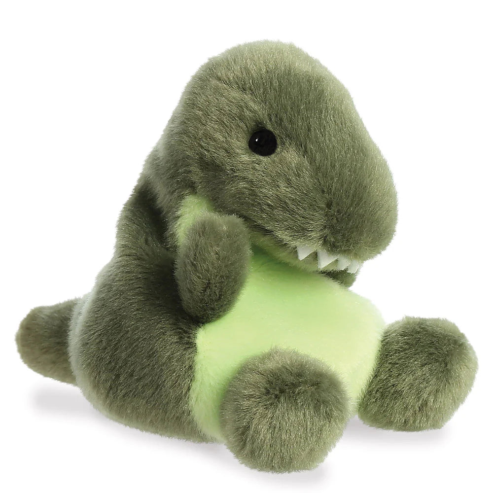 Palm Pals Tyranno Rex plush, a small palm-sized stuffed T-rex with a dark olive green body, pale lime green belly, white embroidered teeth, and a tiny black bead eye