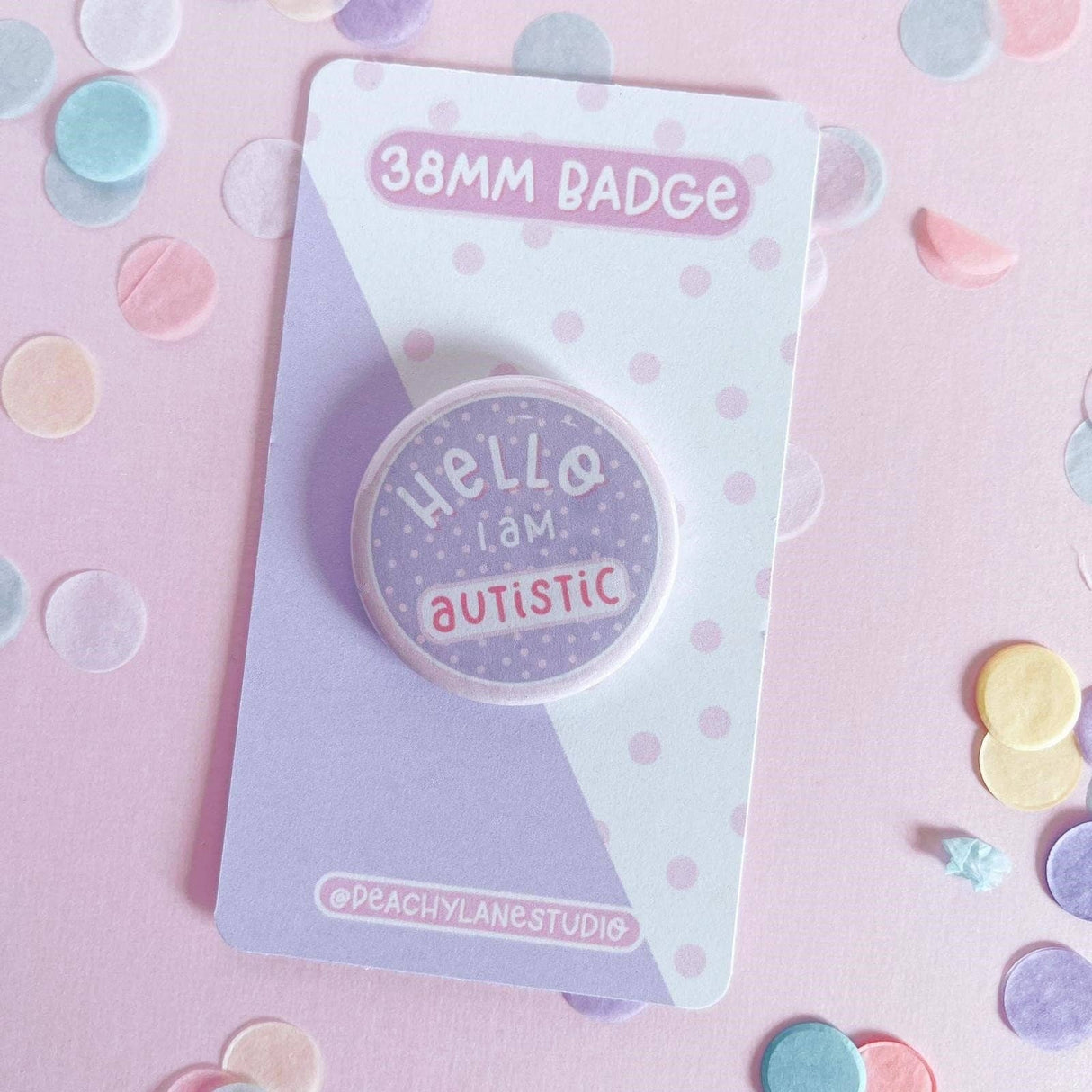 Peachy Lane Studio Hello I Am Autistic 38mm badge, lilac, with confetti background