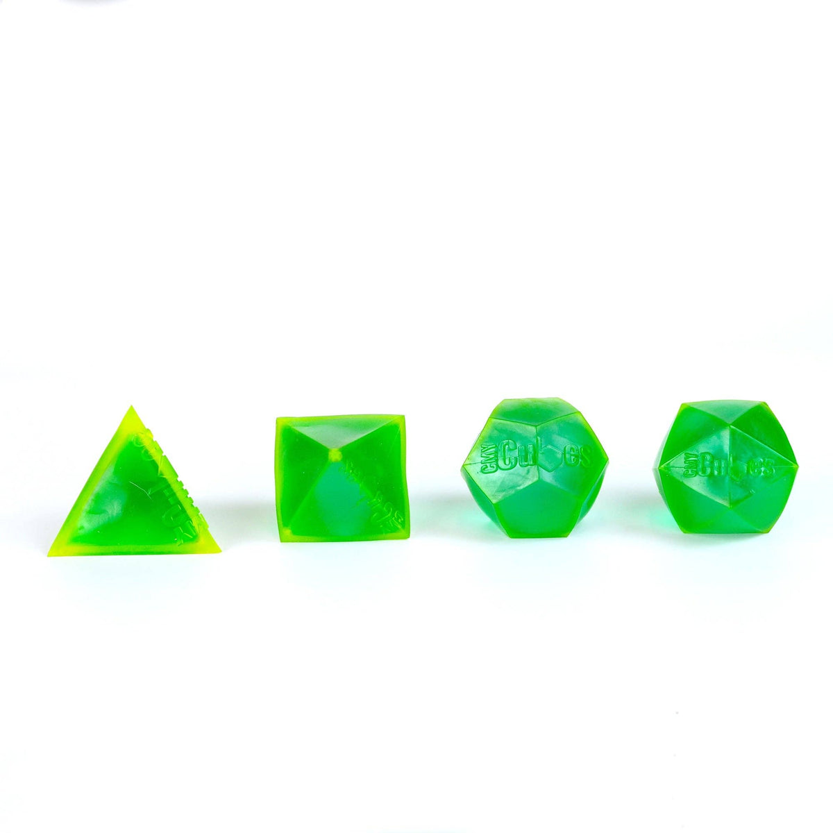 Set of green glow in the dark rare polyhedral squishies on a white background