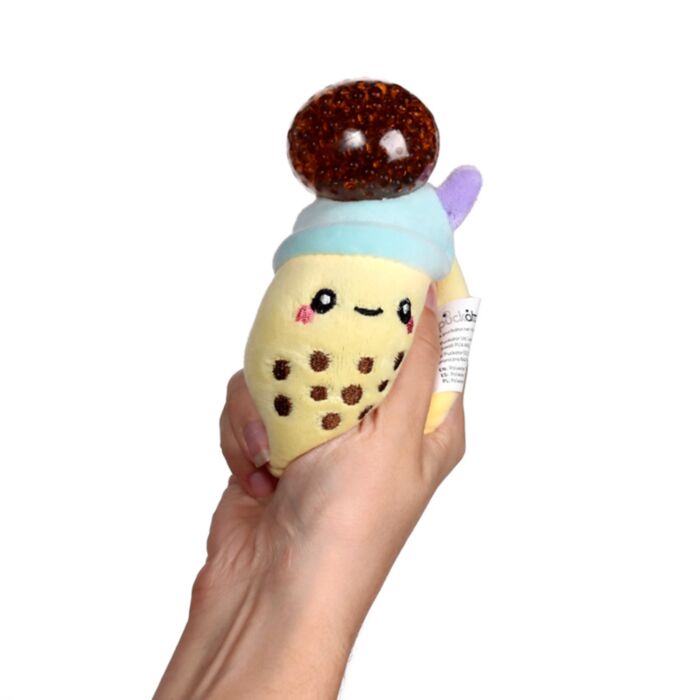 Yellow Queasy Squeezies bubble tea plush — brown bead stress ball pops out on squeeze