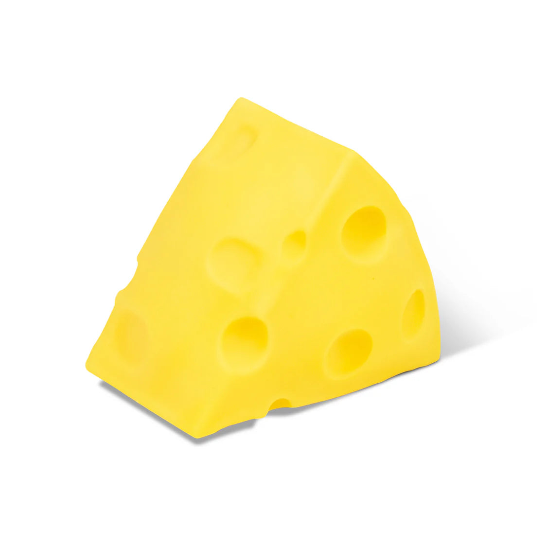 Plain yellow squishy cheese wedge with dimpled holes, no face, side angle