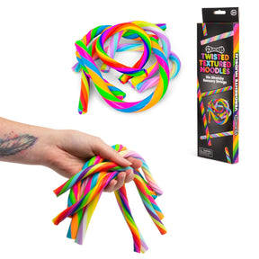 Tattooed hand holding a bundle of rainbow Scrunchems Twisted Textured Noodles alongside the product box