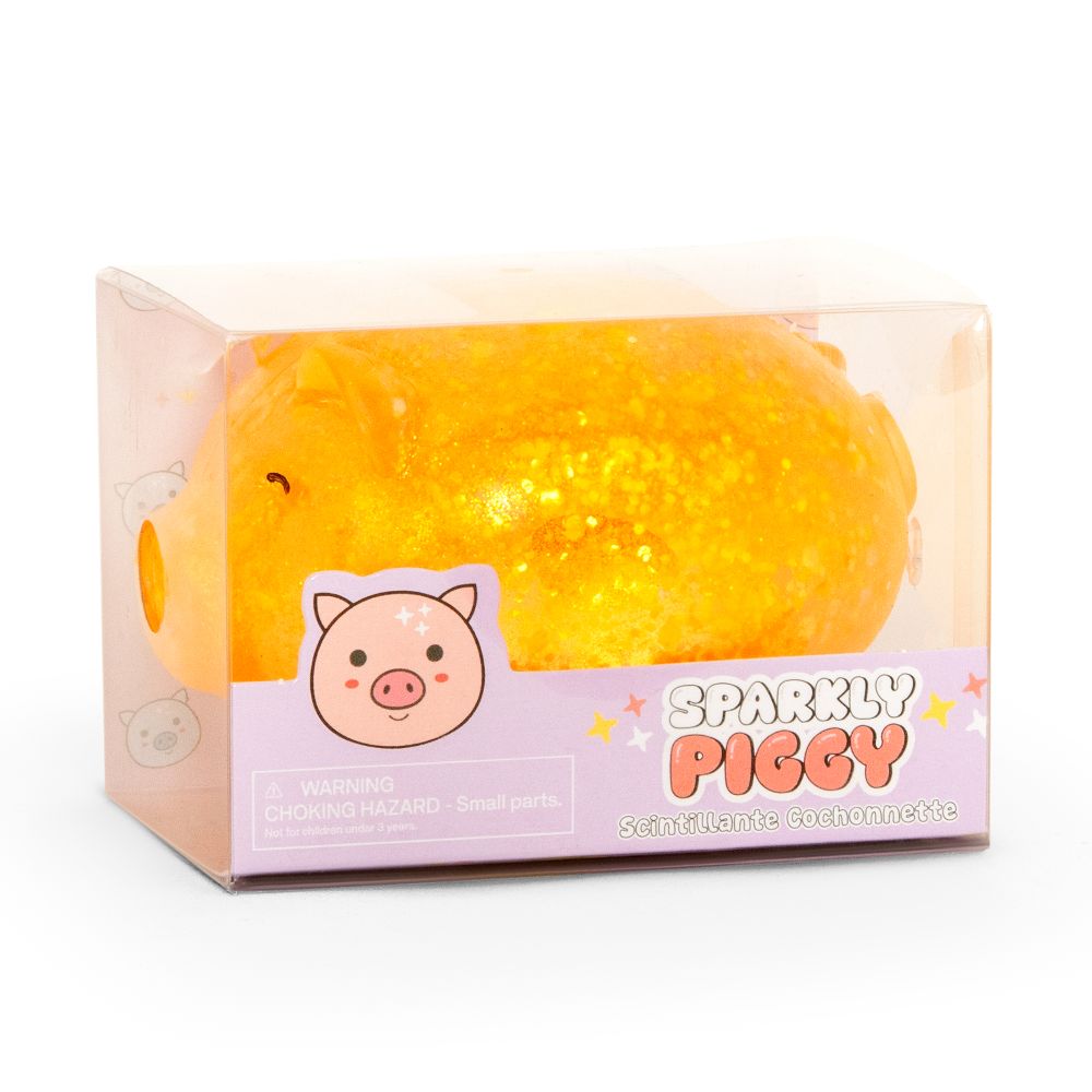 Yellow orange glitter squishy pig toy in clear Sparkly Piggy branded packaging