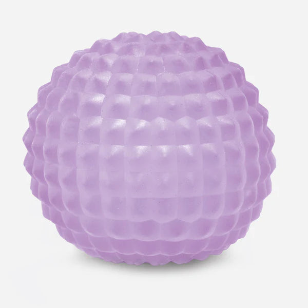 Speks Gump Surface stress ball in purple Mist Scale colour, showing raised scale surface texture