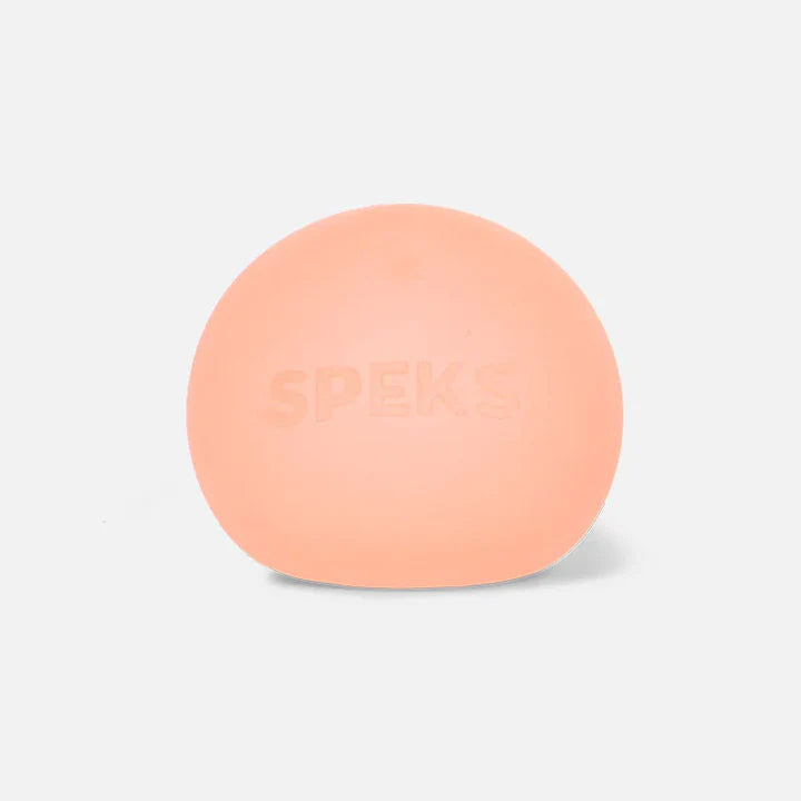 Single peach Speks Mini Gump memory gel stress ball on a white background