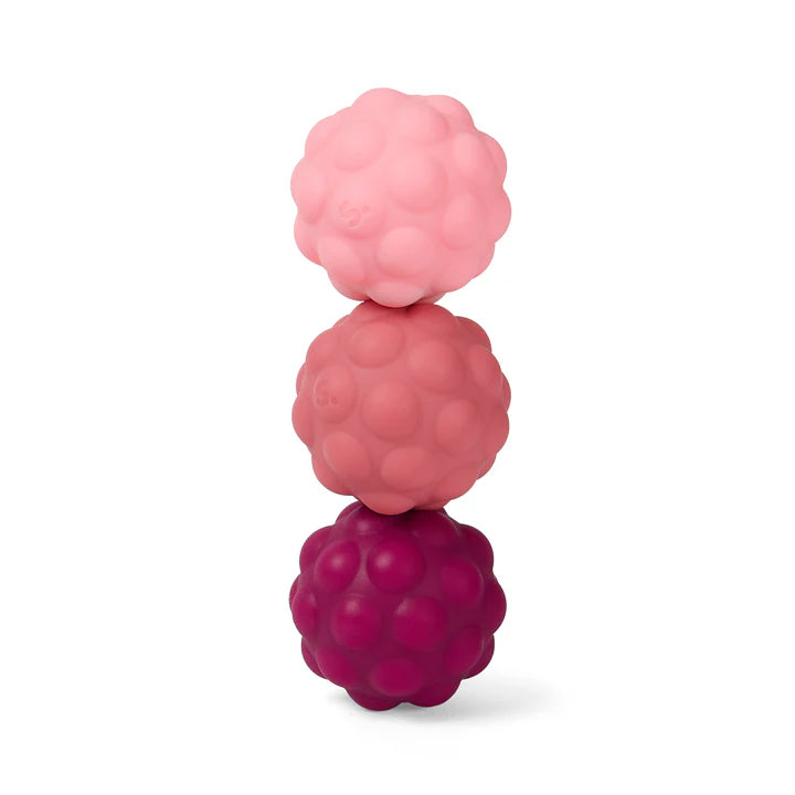 Speks Odds Purple Bumps fidget magnet balls stacked, pink to deep purple