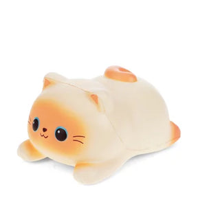 Side view of a cream and orange kawaii loaf cat slow-rise squishy toy