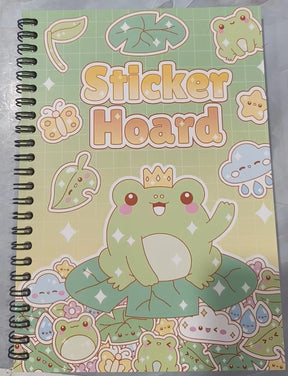 Kawaii Sticker Hoard spiral book with frog king on lily pad cover design on green background