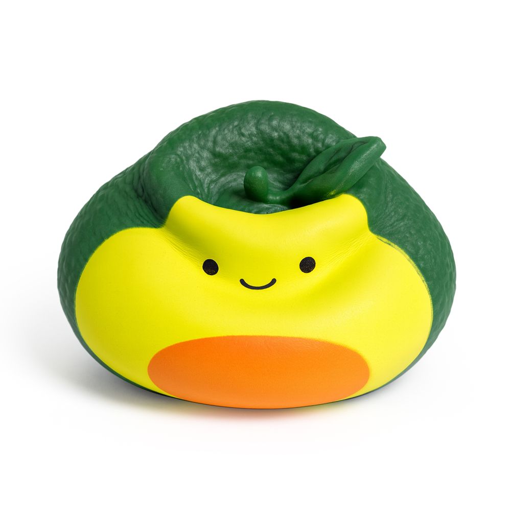Kawaii avocado Stretch N Smash fidget toy shown squashed flat, displaying the texture of the stretched outer skin