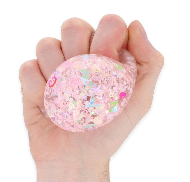 Stretch N Squeeze Confetti Ball pink glitter sequin stress fidget ball held in hand