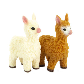 Cute stretchy bean-filled llama toys in white and brown shown together side view, realistic fluffy texture detail on white background