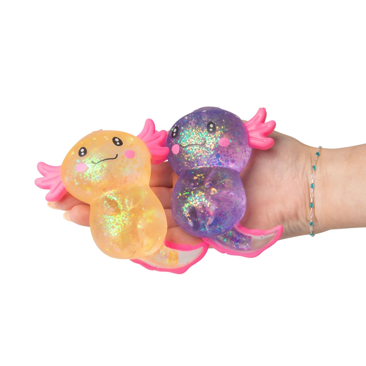 Open palm holding orange and purple large Sugar Axolotl squishies resting side by side