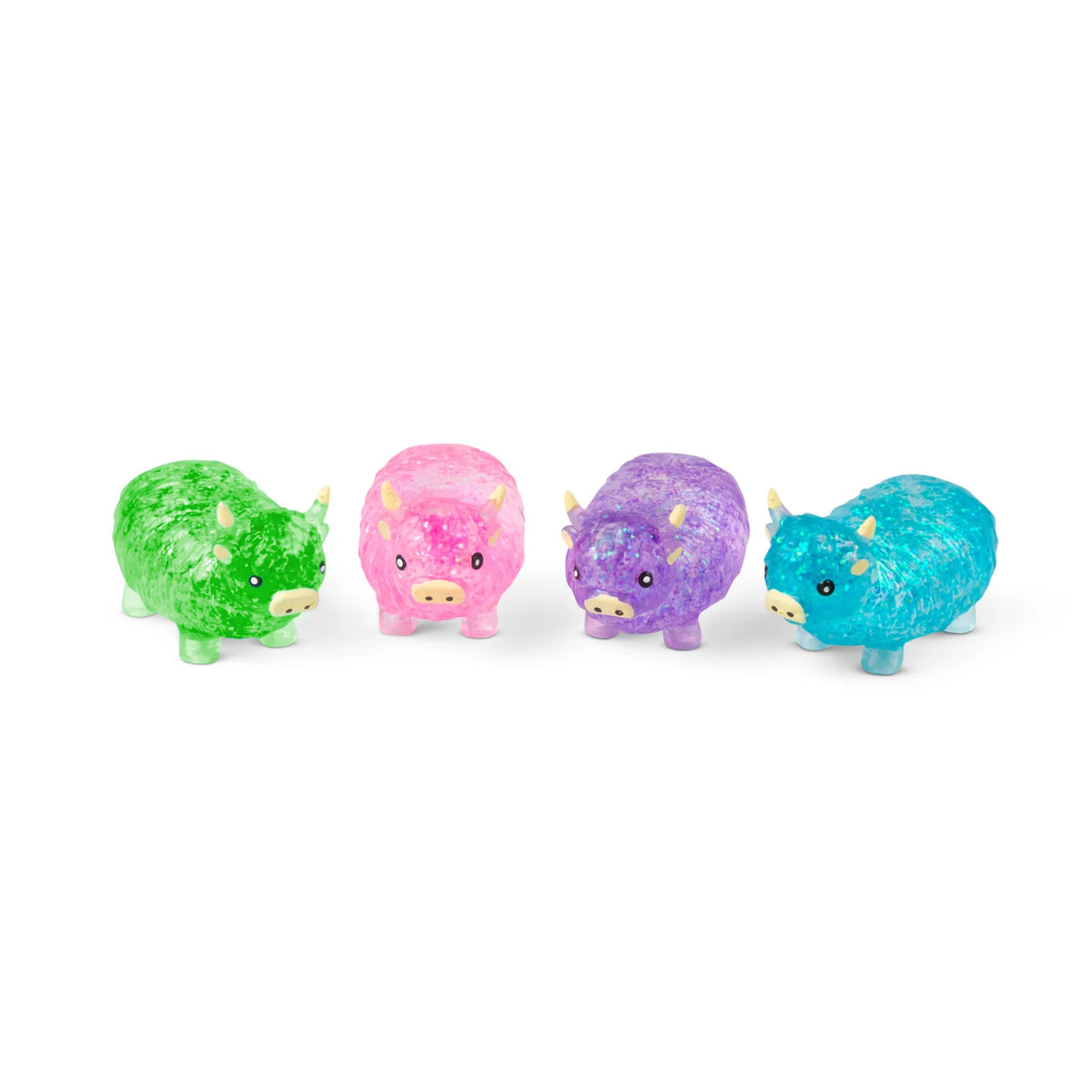 All four Sugar Highland Cow glitter squishies lined up in green, pink, purple, and blue