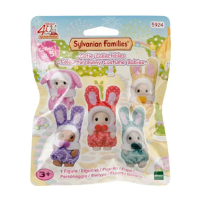 Sylvanian Families 'Colourful Bunny Costume Babies' 5-pack toy set in its original blister packaging, featuring five small plush bunny figures in different pastel-colored outfits.