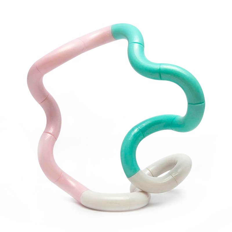 Mint, pink and cream Tangle Jr. Clouds twisty fidget toy twisted into a wavy shape