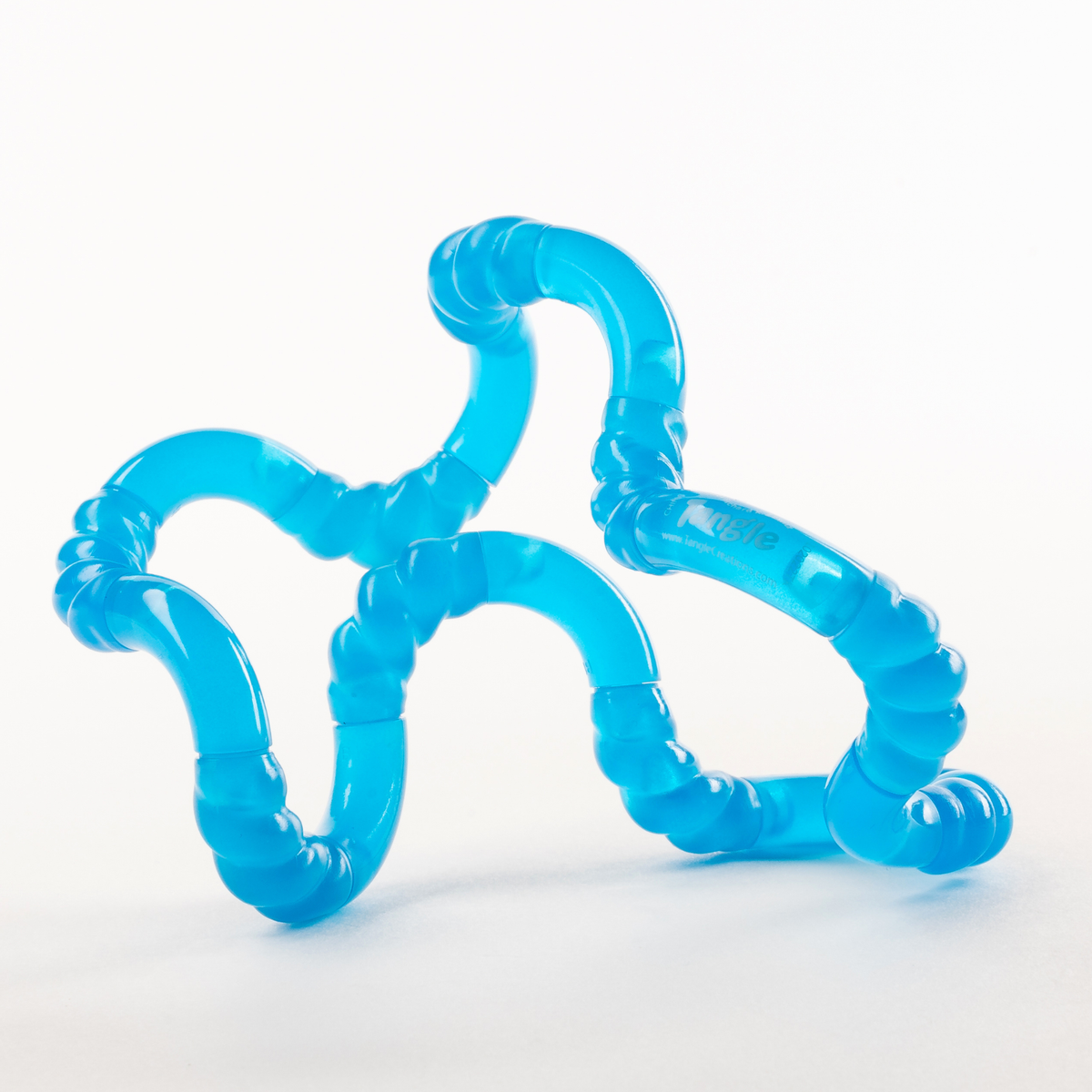 Blue glow-in-the-dark Tangle Jr. textured twisty fidget toy twisted into loops and curves