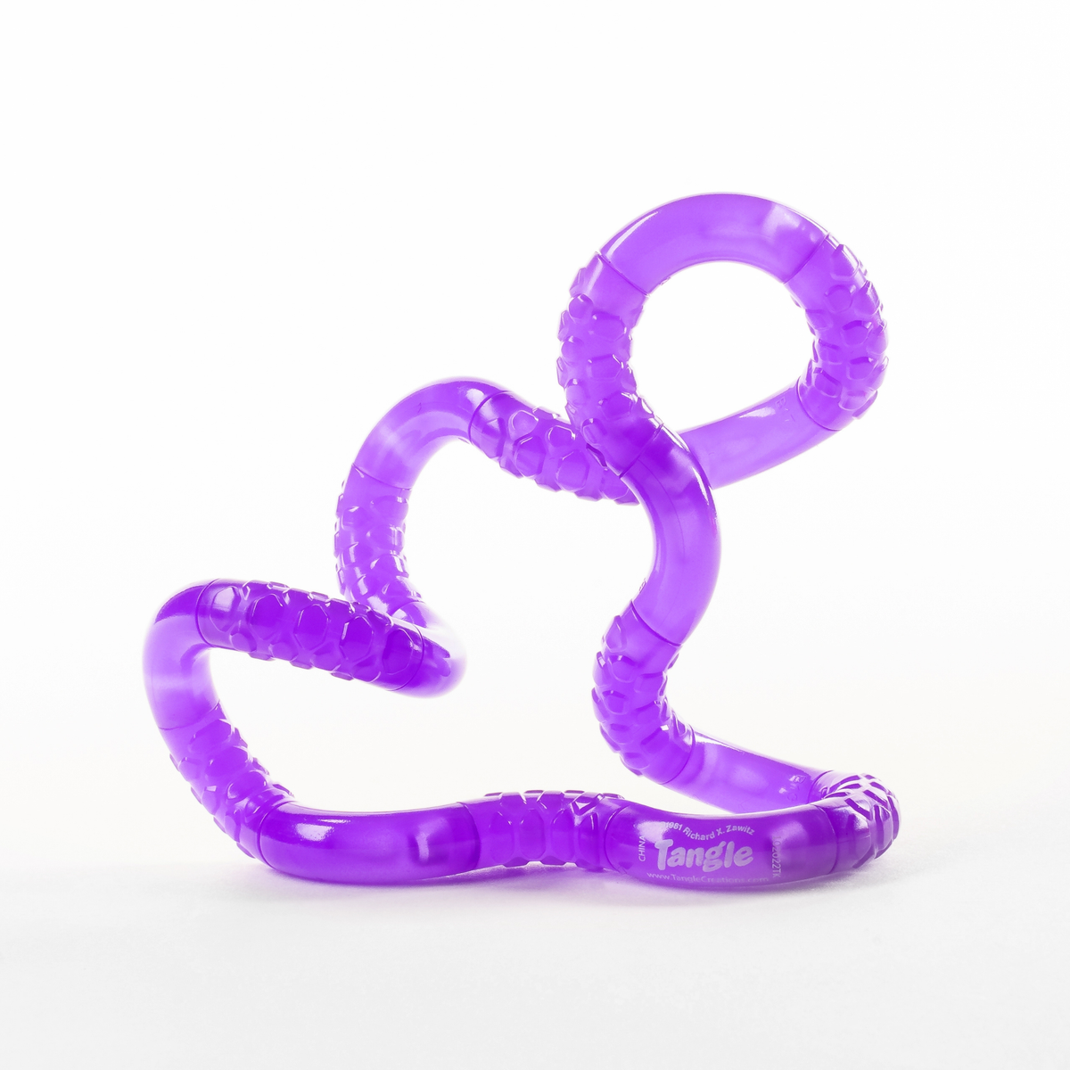 Purple glow-in-the-dark Tangle Jr. textured twisty fidget toy twisted into loops and curves