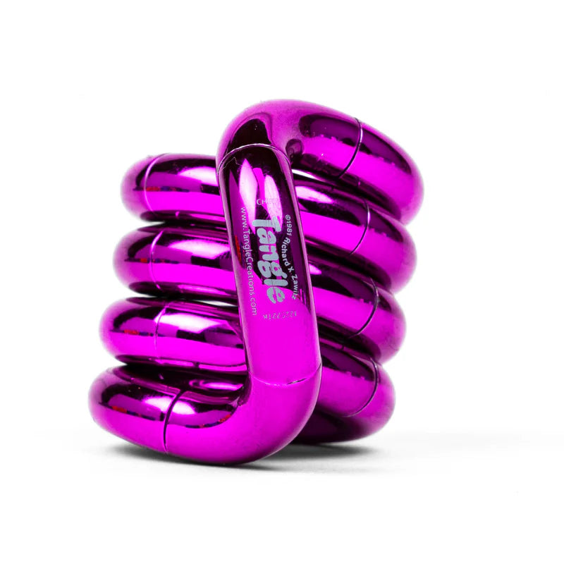 Pink metallic Tangle Jr. fidget toy coiled into its resting spiral shape showing chrome finish