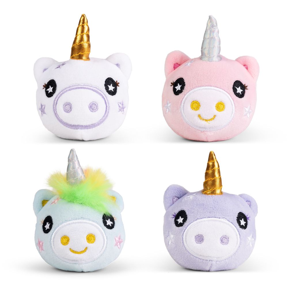 Four kawaii unicorn plushie sensory toys in white, pink, lilac, and blue shown together from the front