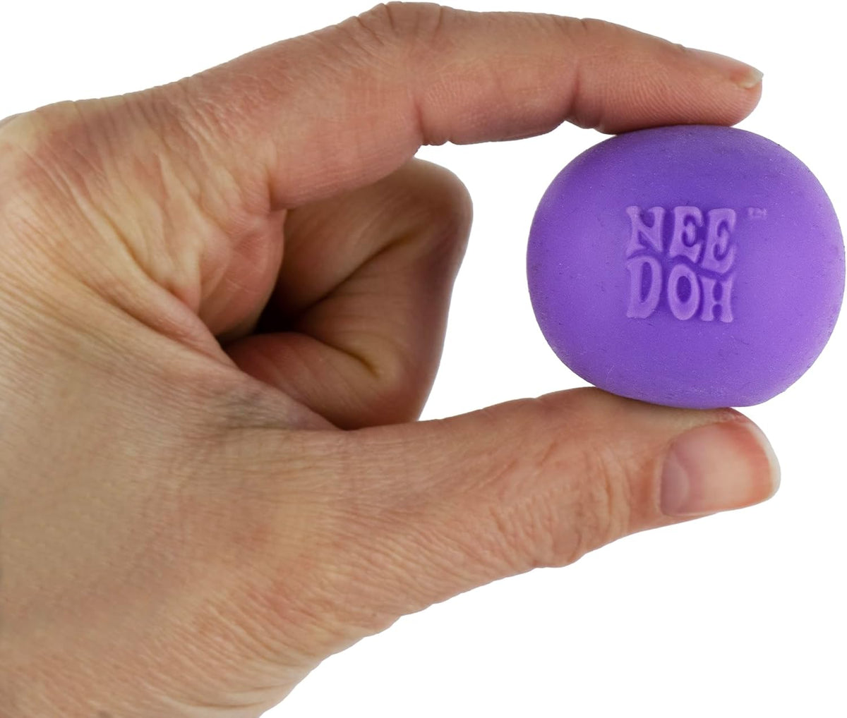 Hand holding a purple World's Smallest Nee Doh Groovy Glob mini squish ball